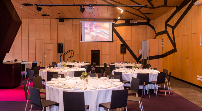 Indigo Room Round Table Setup View of Stage